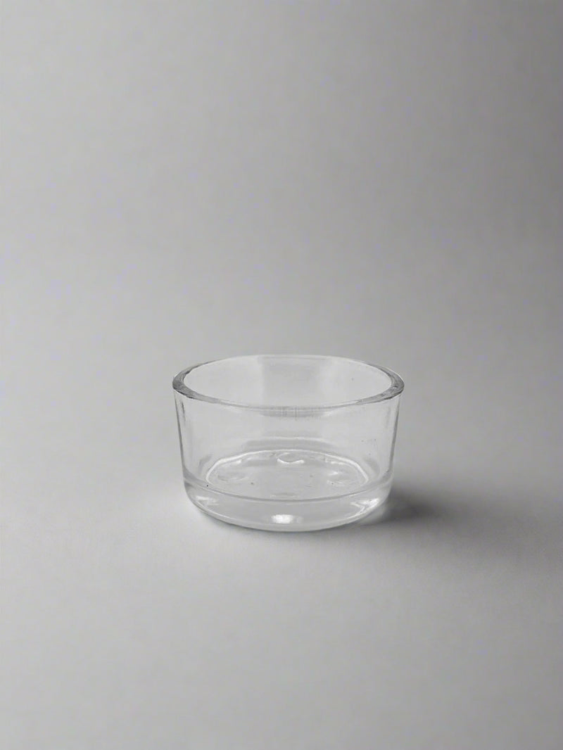 Glass tea light holder