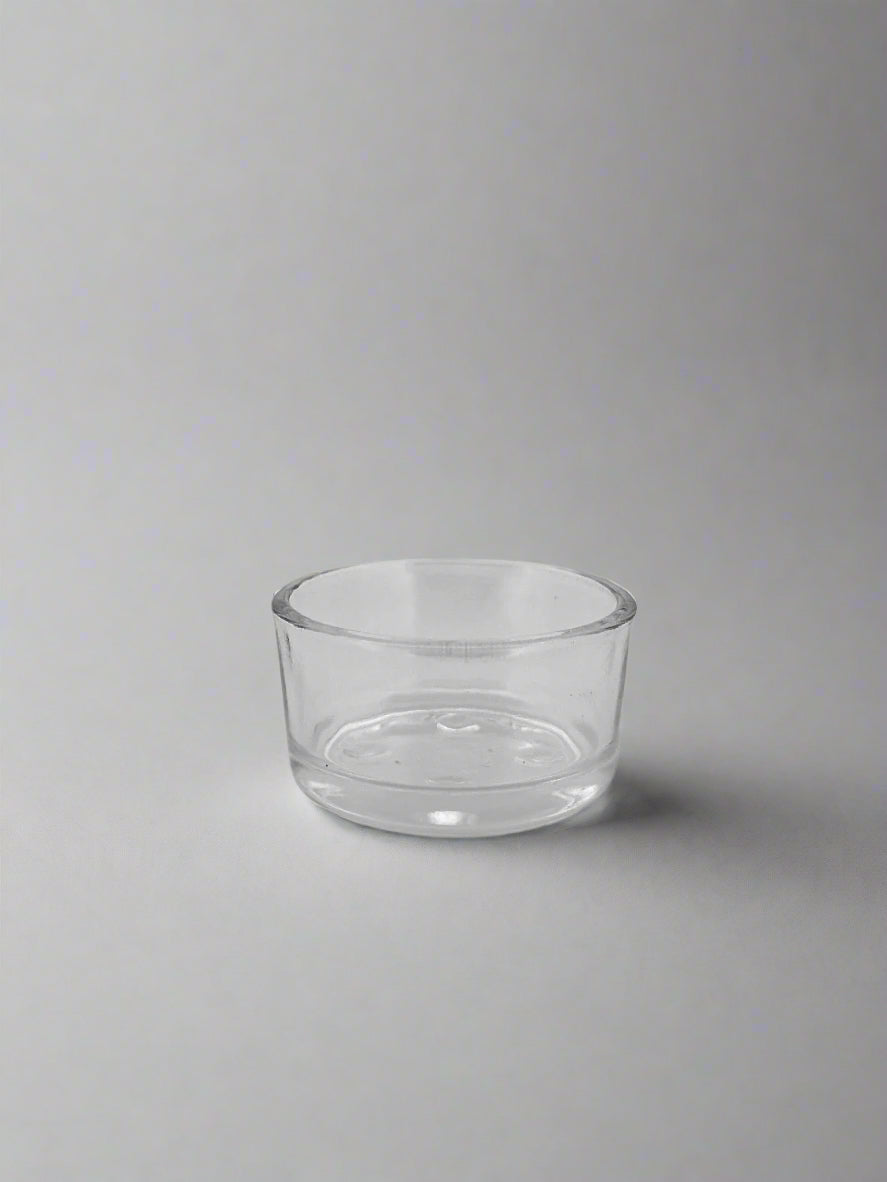 Glass tea light holder