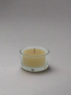 Glass tea light holder