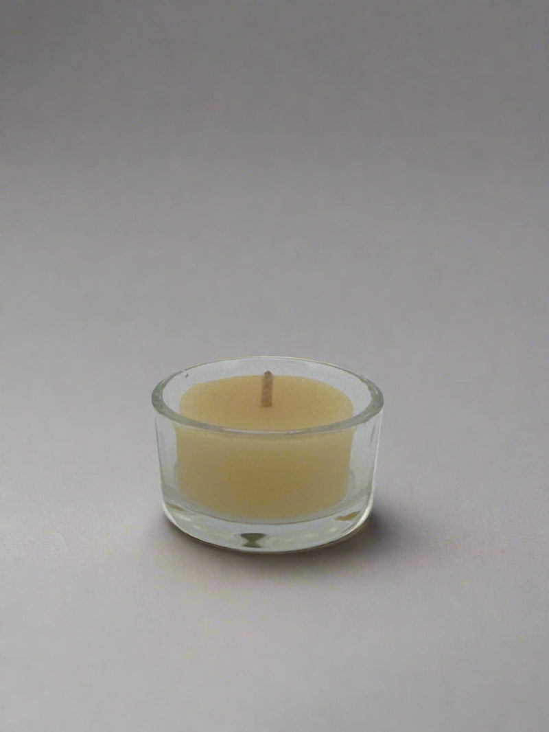 Glass tea light holder